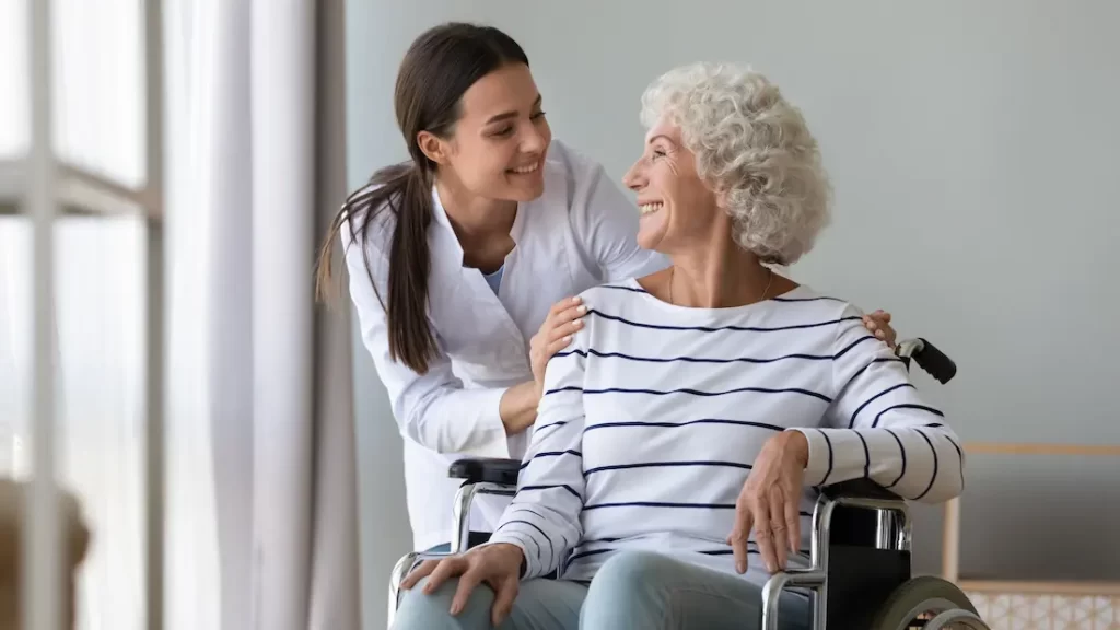 smiling caregiver and senior